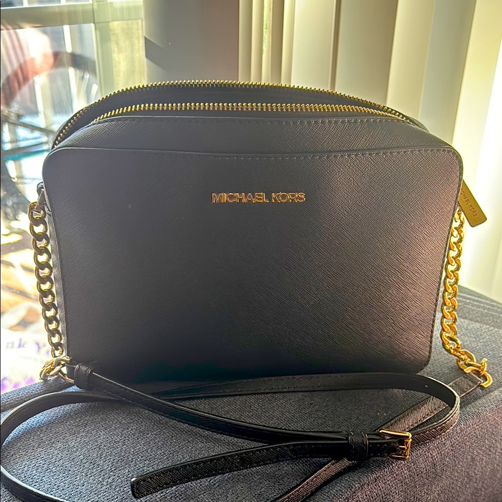 Michael Kors Black Crossbody Bag, few cracks on the strap